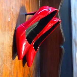 Red high heel pumps